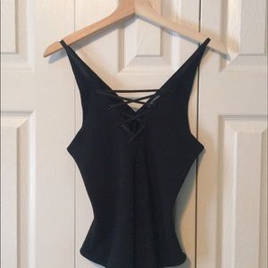 Black Asymmetric Cross Bodysuit from Express